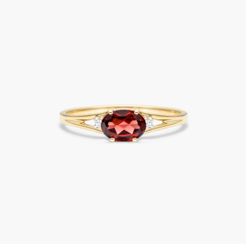 Oval Garnet And Diamond Accent Birthstone Ring In 14K Yellow Gold