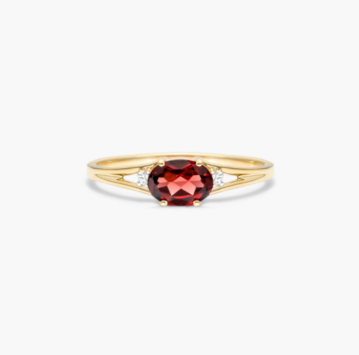 Oval Garnet And Diamond Accent Birthstone Ring In 14K Yellow Gold
