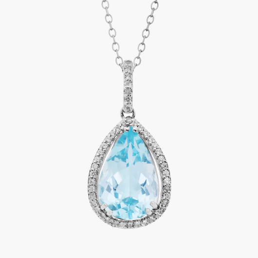Sky Blue Topaz Elegant Halo Pendant in Sterling Silver (14x9mm)