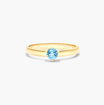 Blue Topaz Solitaire Birthstone Ring In 14K Yellow Gold