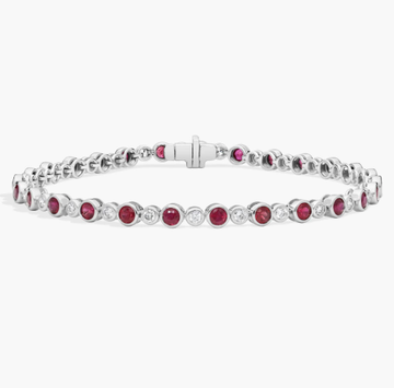 Alternating Ruby and Diamond Bracelet with 0.75 CTW Round Cut Diamonds in 14K White Gold Bezel Setting