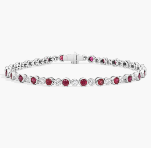 Alternating Ruby and Diamond Bracelet with 0.75 CTW Round Cut Diamonds in 14K White Gold Bezel Setting
