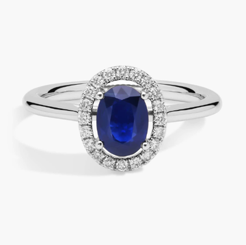 Floating Oval Sapphire and Diamond Micropavé Diamond Halo Ring in 14k White Gold (7x5mm)