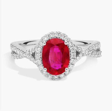 Oval Ruby and Diamond Halo Twist Ring (8x6mm)