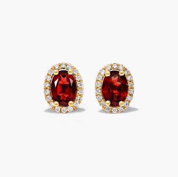 Oval Cut Garnet And Diamond Halo Stud Earrings In 14K Yellow Gold