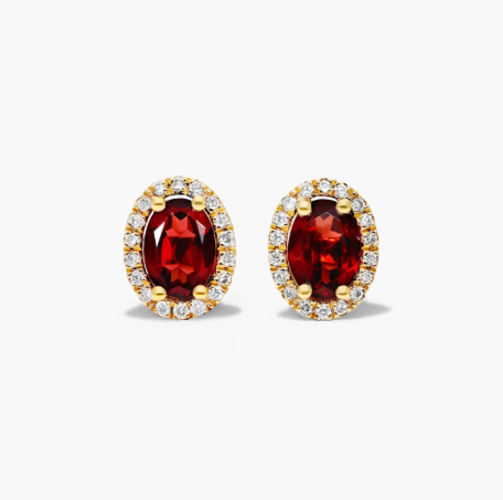 Oval Cut Garnet And Diamond Halo Stud Earrings In 14K Yellow Gold