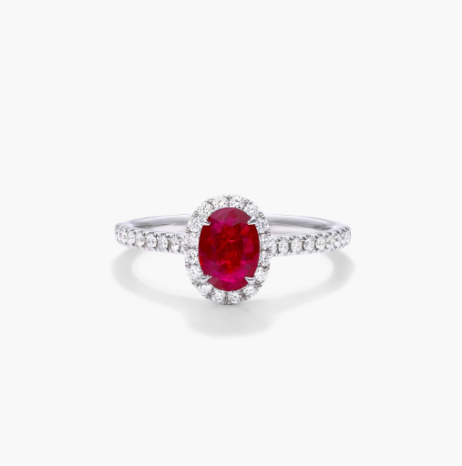 Oval Halo Ruby And Diamond Ring In 18K White Gold