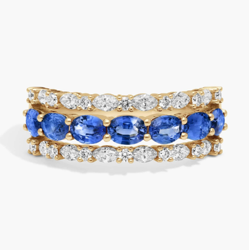 East-West Oval Cut Blue Sapphire and Diamond Ring In 14K Yellow Gold (7.25mm)