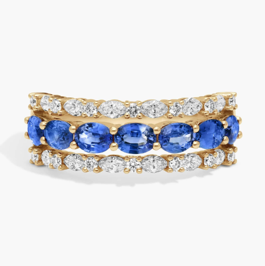 East-West Oval Cut Blue Sapphire and Diamond Ring In 14K Yellow Gold (7.25mm)