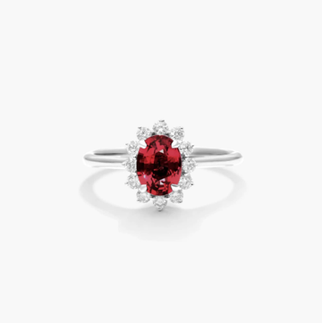 Oval Halo Ruby And Diamond Ring In 18K White Gold