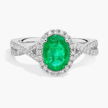 Oval Emerald and Diamond Halo Twist Ring (8x6mm)